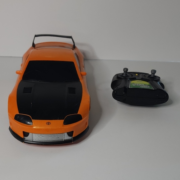 Jada Toys JDM Tuners Orange 1995 Toyota Supra R/C - Picture 3 of 9